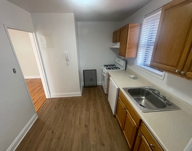 102-30 67th Avenue - Photo Thumbnail 4