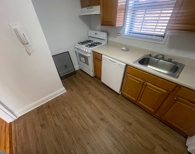 102-30 67th Avenue - Photo Thumbnail 3