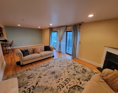 1711 W Jarvis Avenue - Photo Thumbnail 3