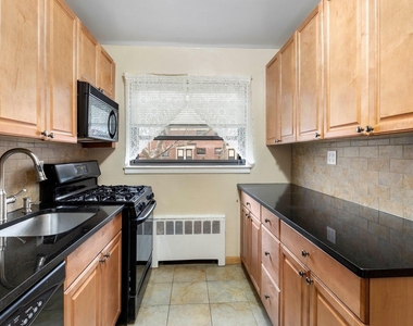219-82 75th Avenue - Photo Thumbnail 7