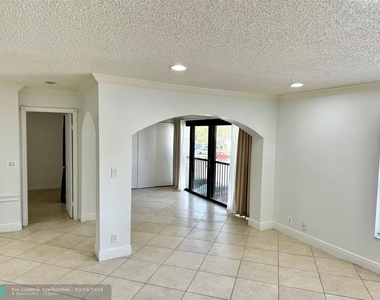 3939 Carambola Cir - Photo Thumbnail 4