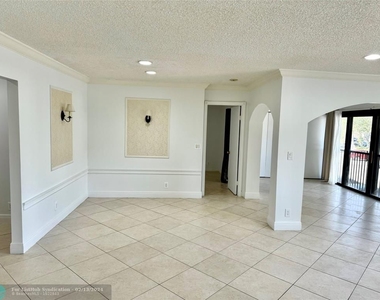 3939 Carambola Cir - Photo Thumbnail 7