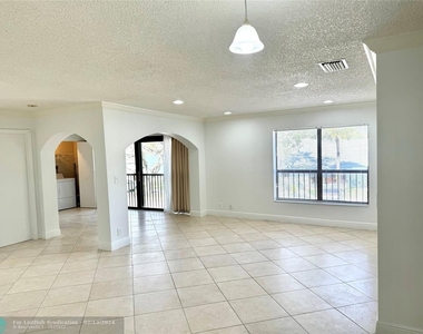 3939 Carambola Cir - Photo Thumbnail 2