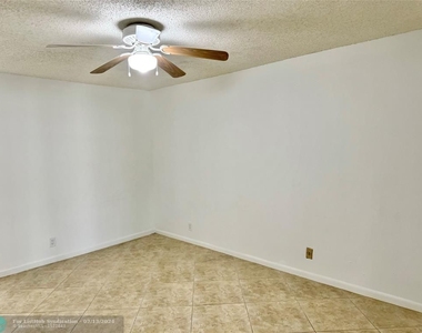 3939 Carambola Cir - Photo Thumbnail 13