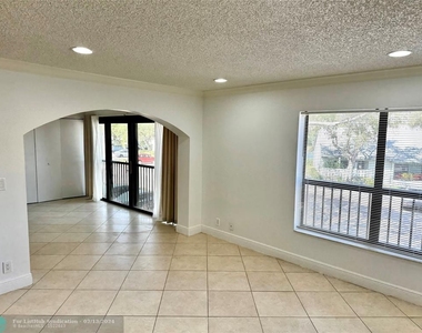 3939 Carambola Cir - Photo Thumbnail 6