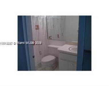 825 Brickell Bay Dr - Photo Thumbnail 1