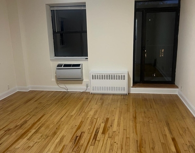 201 East 12th Street - Photo Thumbnail 3