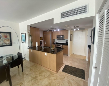 10275 Collins Ave - Photo Thumbnail 2