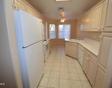 9041 W Behrend Drive - Photo Thumbnail 5