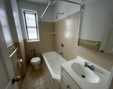 99-49 64th Road - Photo Thumbnail 1