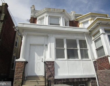 5719 Spruce Street - Photo Thumbnail 1