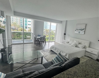 10275 Collins Ave - Photo Thumbnail 1