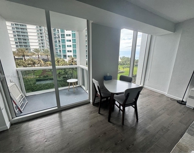 10275 Collins Ave - Photo Thumbnail 2