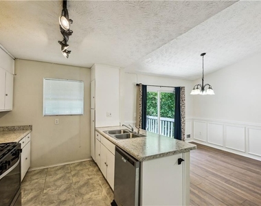 5602 St Thomas Drive - Photo Thumbnail 9