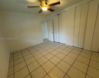 1250 S Alhambra Cir - Photo Thumbnail 3