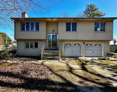 283 Commack Road - Photo Thumbnail 1