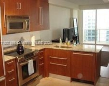 10275 Collins Ave - Photo Thumbnail 2