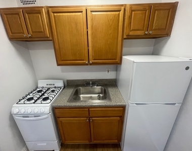 102-40 67th Road - Photo Thumbnail 3