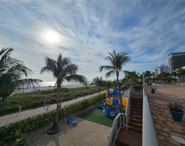 6039 Collins Ave - Photo Thumbnail 15