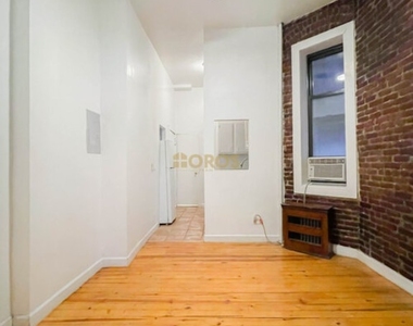 213 East 10th Street - Photo Thumbnail 2