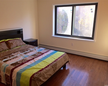 97-40 64th Avenue - Photo Thumbnail 4