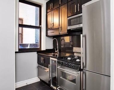 East 23rd Street, Unit 4 - Photo Thumbnail 4