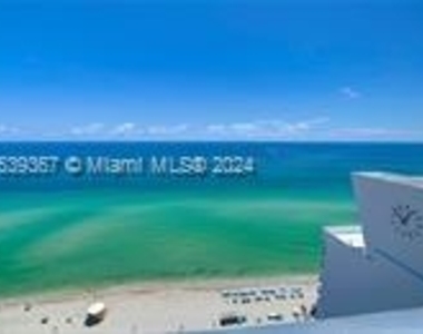 6899 Collins Ave - Photo Thumbnail 1