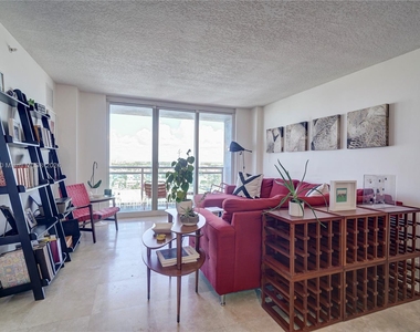 6917 Collins Ave - Photo Thumbnail 1