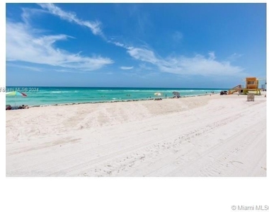 6917 Collins Ave - Photo Thumbnail 0