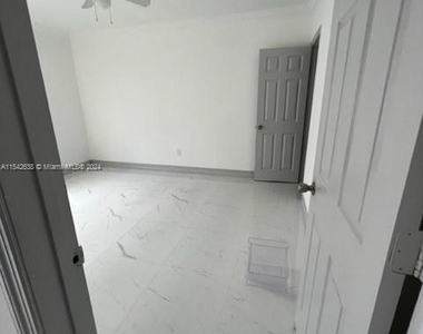 6831 Abbott Ave - Photo Thumbnail 1