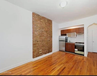 453 W 47th St - Photo Thumbnail 0