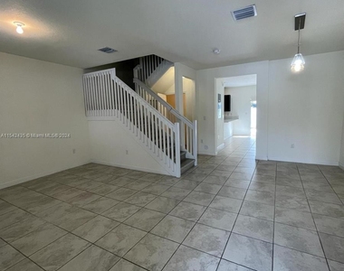 10569 W 33rd Way - Photo Thumbnail 1