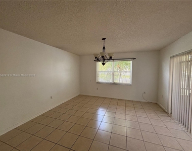 9283 Nw 54th St - Photo Thumbnail 1