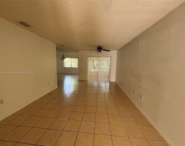 9283 Nw 54th St - Photo Thumbnail 2