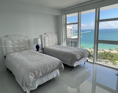 10275 Collins Ave - Photo Thumbnail 11