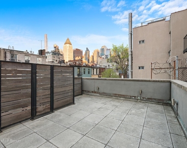 459 W 43rd St - Photo Thumbnail 14