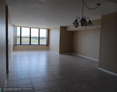 2767 S Carambola Cir - Photo Thumbnail 3