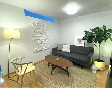 212 East 10th Street - Photo Thumbnail 2