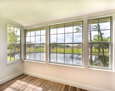 1405 Palm Beach Trace Drive - Photo Thumbnail 0