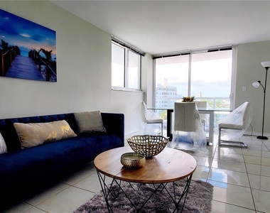 2457 Collins Ave - Photo Thumbnail 2