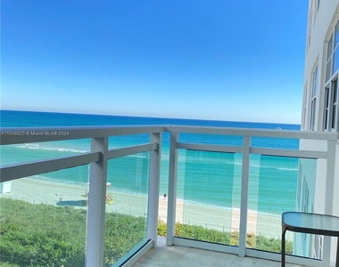 6917 Collins Ave - Photo Thumbnail 0