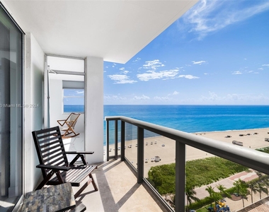 6039 Collins Ave - Photo Thumbnail 1