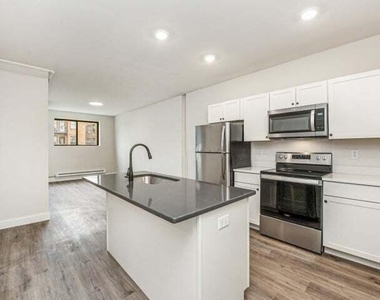 2577 N Downer Ave - Photo Thumbnail 3