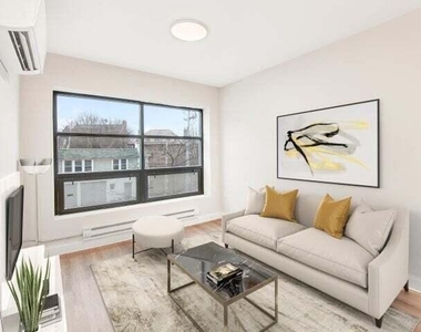 2577 N Downer Ave - Photo Thumbnail 2