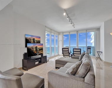 9595 Collins Ave - Photo Thumbnail 3