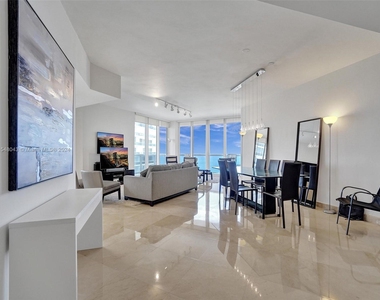 9595 Collins Ave - Photo Thumbnail 1