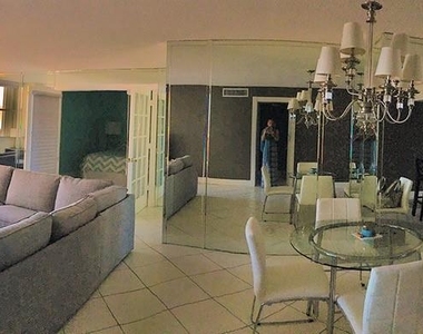 6039 Collins Ave - Photo Thumbnail 2