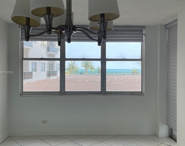 6039 Collins Ave - Photo Thumbnail 10