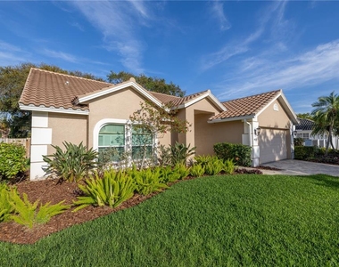 4832 Queen Palm Terrace Ne - Photo Thumbnail 2