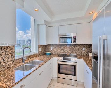 6917 Collins Ave - Photo Thumbnail 2